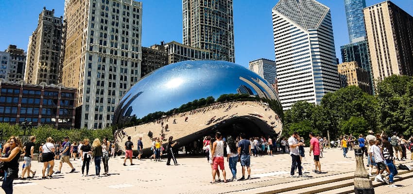 groups of tourists at Cloud Gate in Millennium Park chicago 